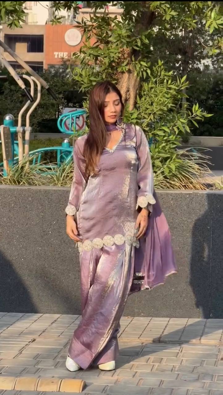 Boldly Beautiful Purple Suit Fashion Statement