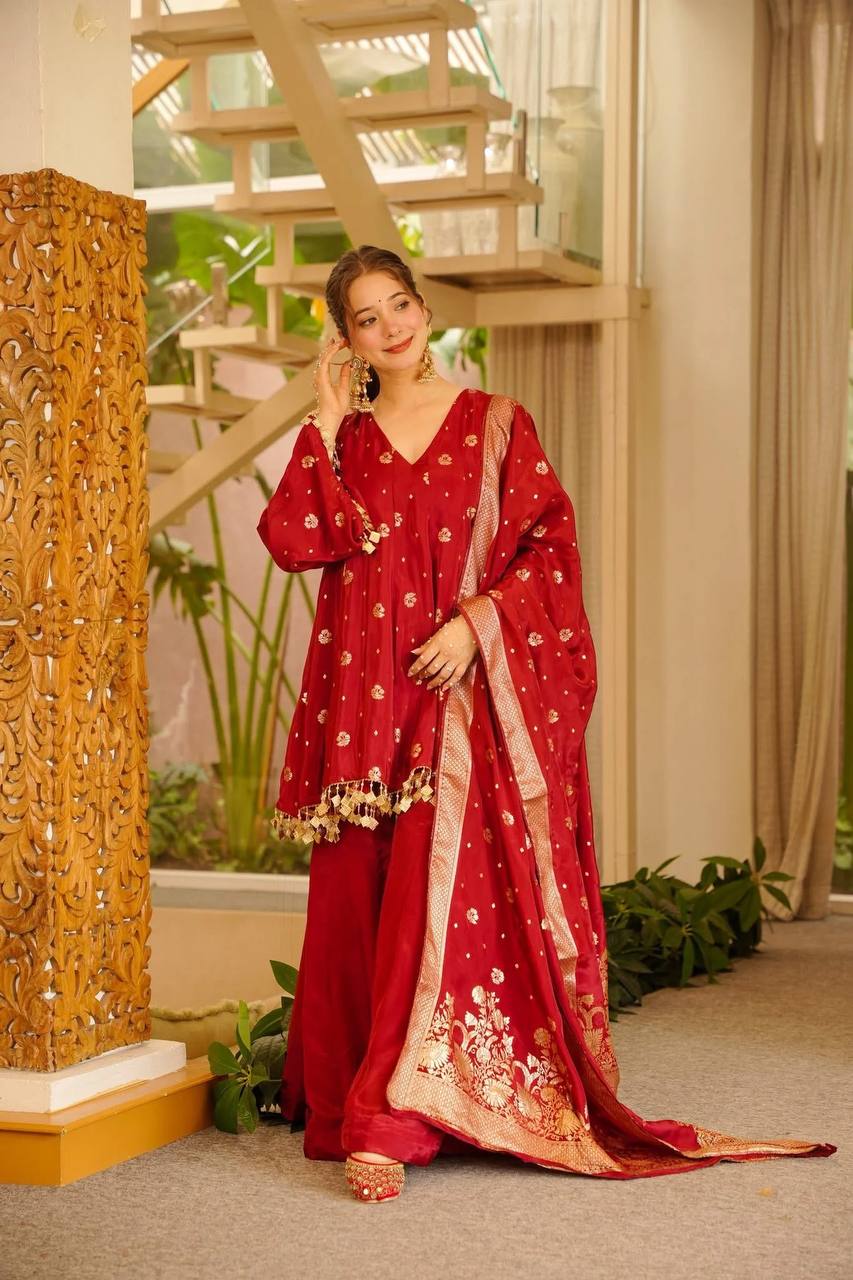 Radiant Elegance A Woman in Red and Gold