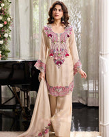Intricately embroidered festive ethnic tunic suit set.