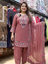 Intricately embroidered festive ethnic tunic suit set.