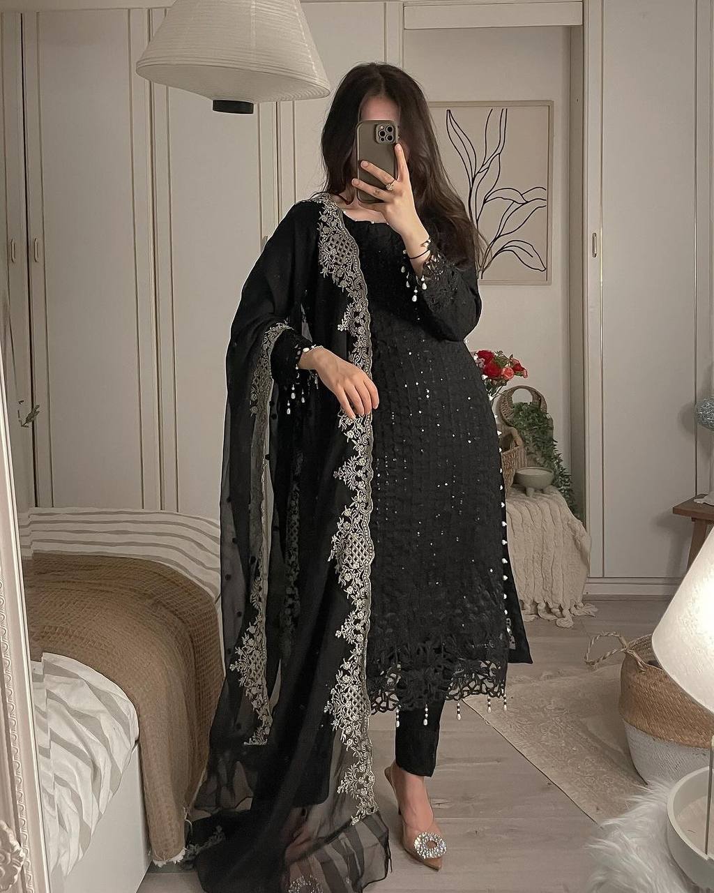 Stylish Black Attire with Beautiful Detailing