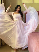 Elegant light pink Anarkali gown with embellishments
